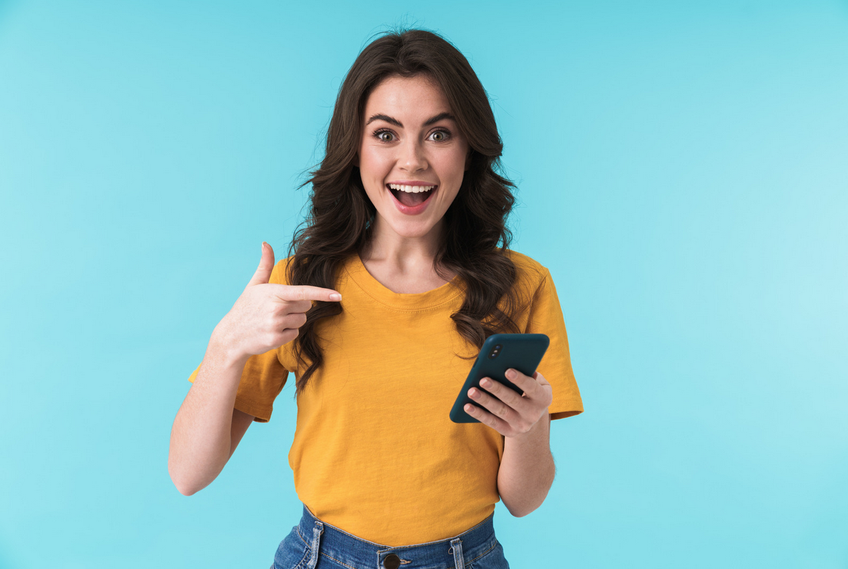 girl pointing to mobile phone